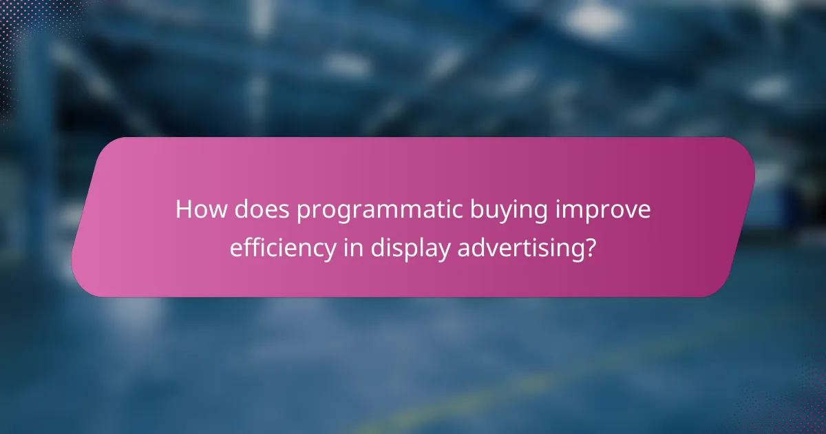 How does programmatic buying improve efficiency in display advertising?